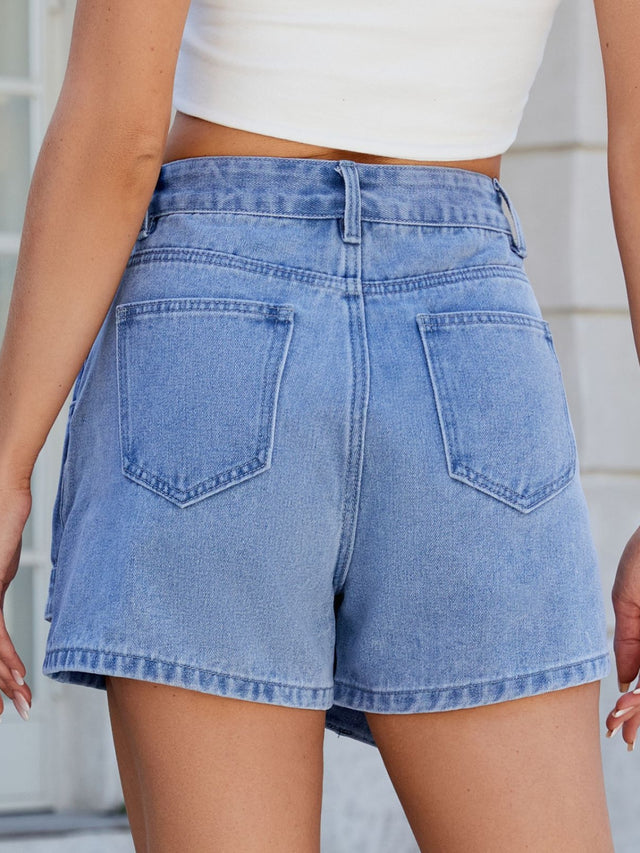 Asymmetrical denim skort with pockets.