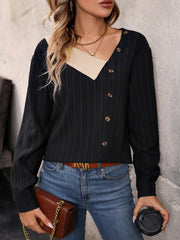 Perfee asymmetrical neck decorative button top.