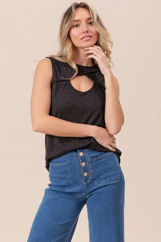Baby rib knit sleeveless top with front cutout details.