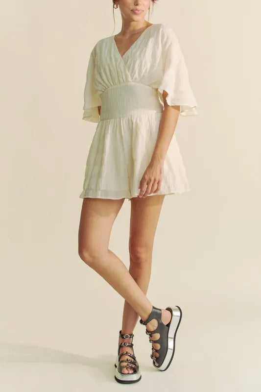 Batwing Sleeve Waist Belt Romper with Ruched and Ruffled Details.