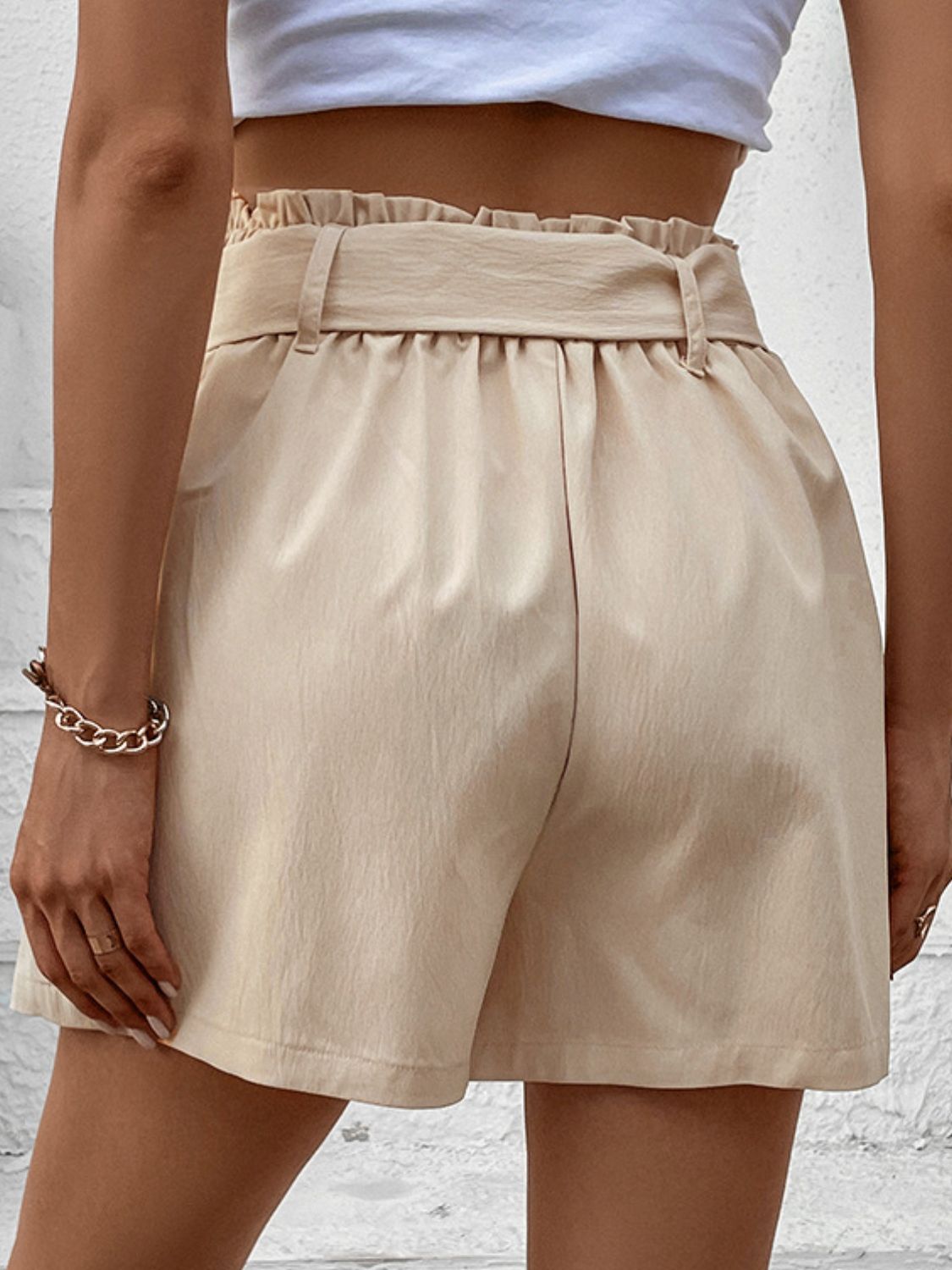 Solid belted shorts with pockets.