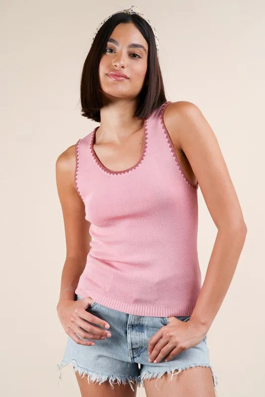 Blanket style sleeveless knit tank with ribbed texture, slightly stretchy.