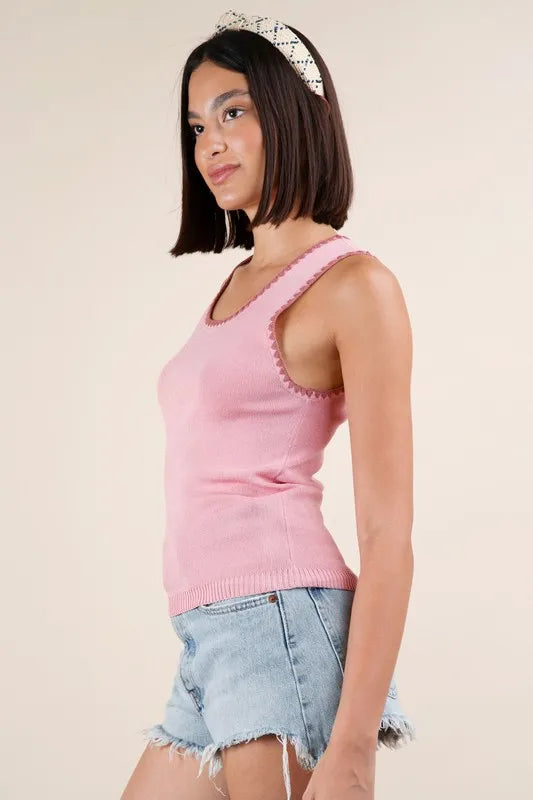 Blanket style sleeveless knit tank with ribbed texture, slightly stretchy.