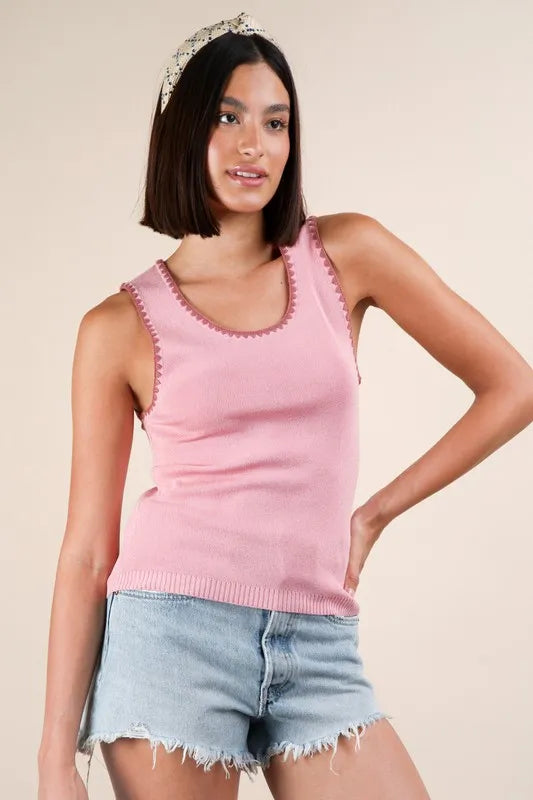 Blanket style sleeveless knit tank with ribbed texture, slightly stretchy.