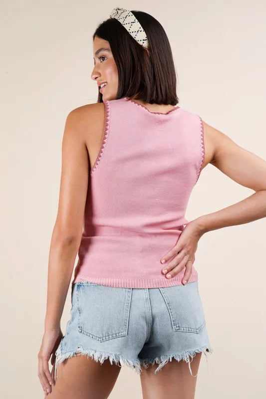 Blanket style sleeveless knit tank with ribbed texture, slightly stretchy.