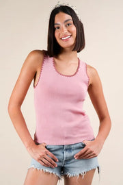 Blanket style sleeveless knit tank with ribbed texture, slightly stretchy.