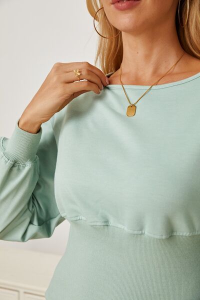 Boat neck lantern sleeve blouse.