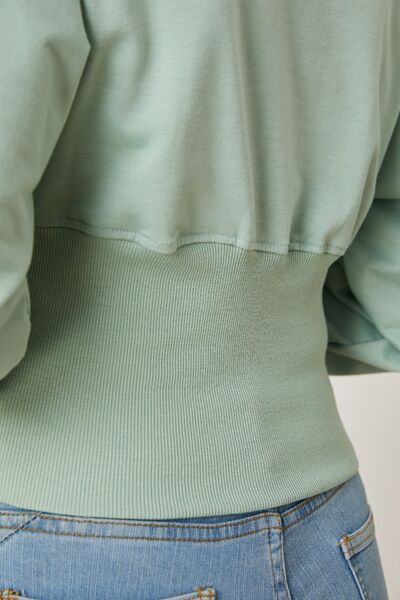 Boat neck lantern sleeve blouse.