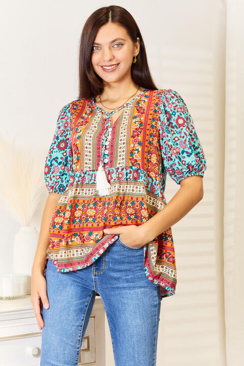 Devine bohemian tassel tie puff sleeve babydoll blouse.