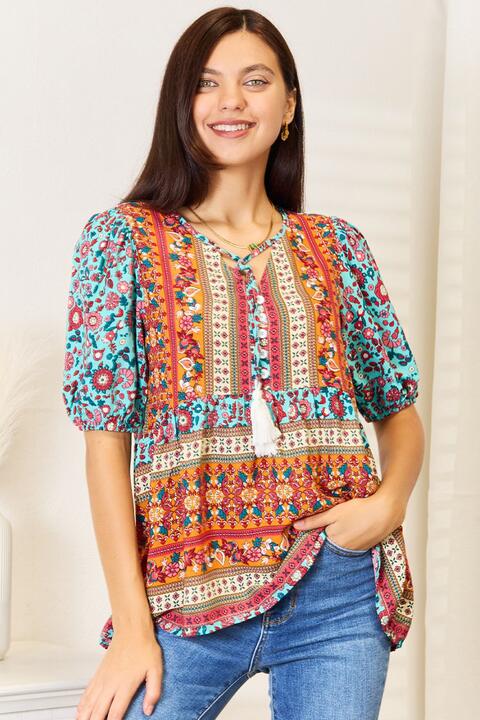 Devine bohemian tassel tie puff sleeve babydoll blouse.
