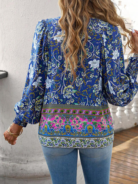 Devine bohemian tie neck lantern sleeve blouse.