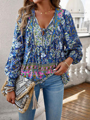 Devine bohemian tie neck lantern sleeve blouse.