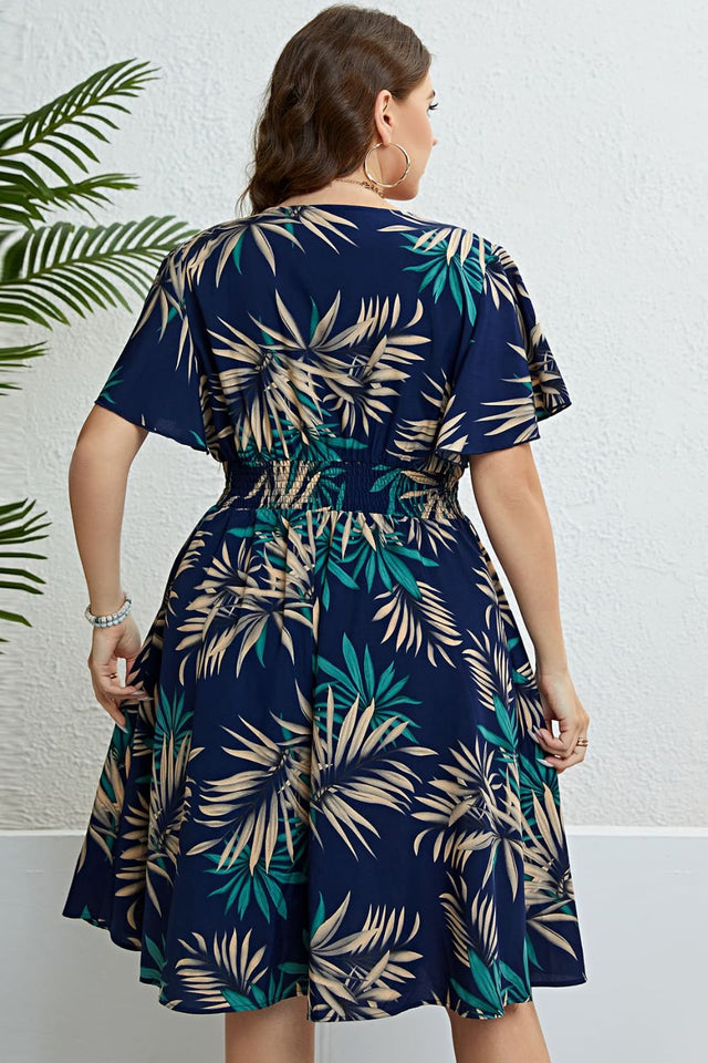 Honey Botanical Print Flutter Sleeve Smocked Waist Dress.