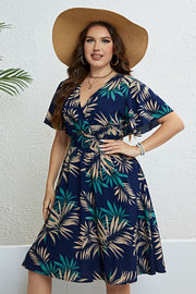 Honey Botanical Print Flutter Sleeve Smocked Waist Dress.