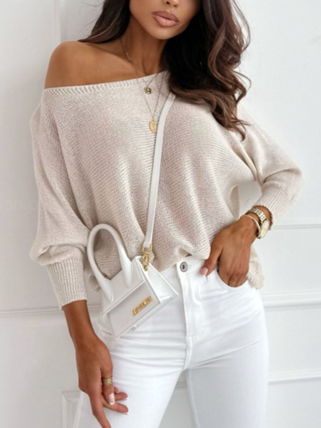 Bow back boat neck batwing sleeve sweater.