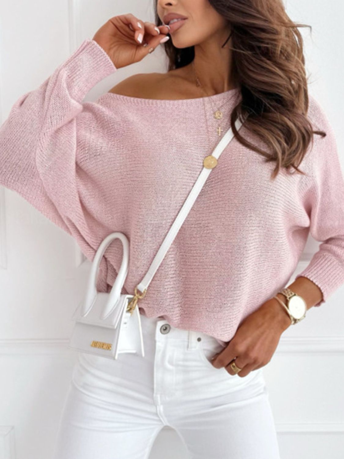Bow back boat neck batwing sleeve sweater.