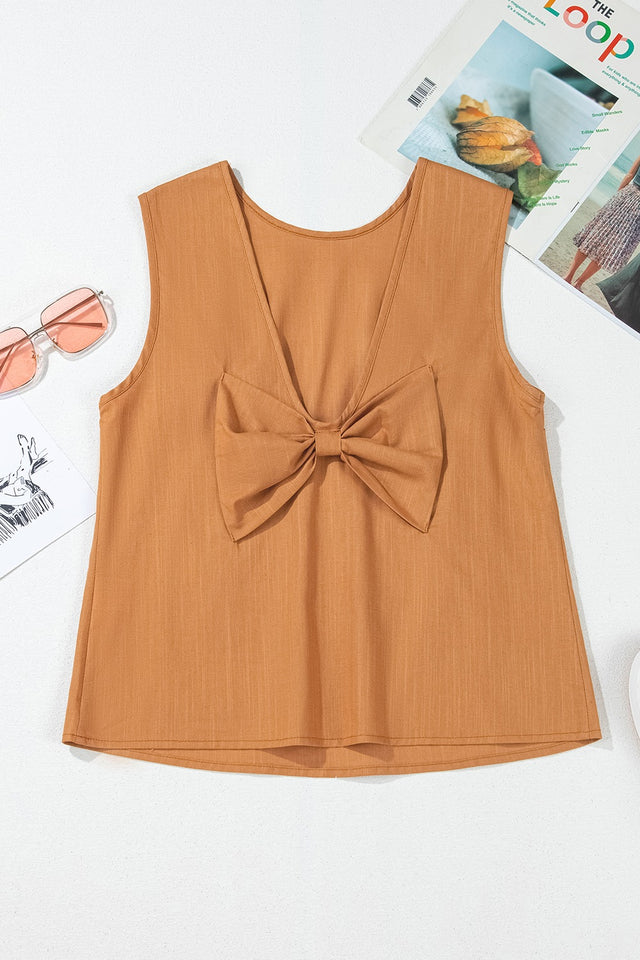 Round neck tank top with bow detail on the back.