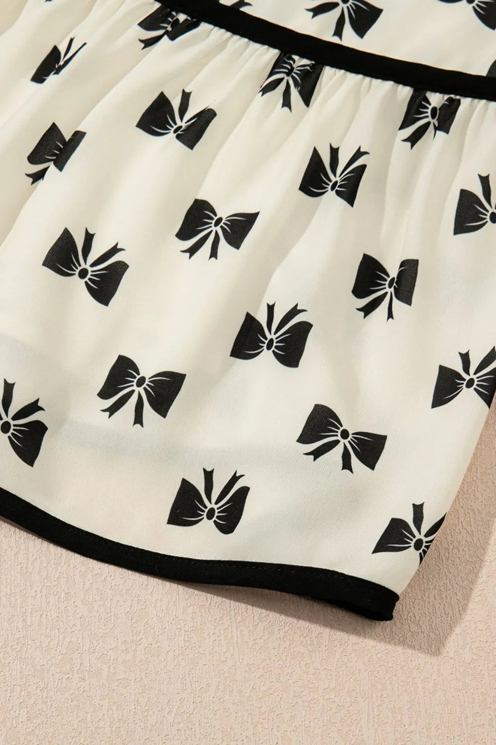 Bow Knot Color Contrast Trim Knotted Shoulder Mini Dress with Tied Detail.