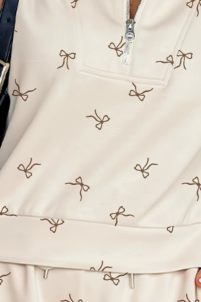 bow print cap sleeve top and shorts set, cute two-piece outfit, women's casual wear, polyester matching set, summer shorts outfit, top with bow detail, comfortable short set with pockets