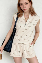 bow print cap sleeve top and shorts set, cute two-piece outfit, women's casual wear, polyester matching set, summer shorts outfit, top with bow detail, comfortable short set with pockets