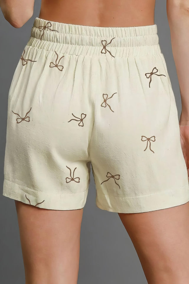 Women's bow print lace casual shorts with drawstring.