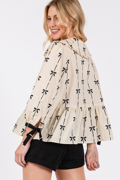 Sage Fig bow print tie front babydoll blouse.