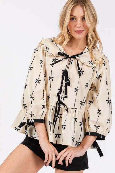 Sage Fig bow print tie front babydoll blouse.
