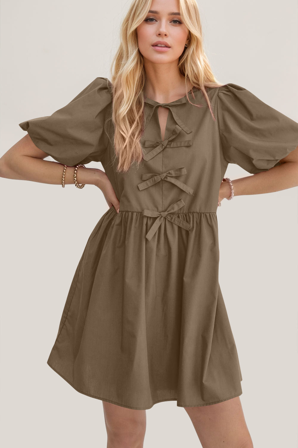 Oh Bow Ruched Puff Sleeve Mini Dress.