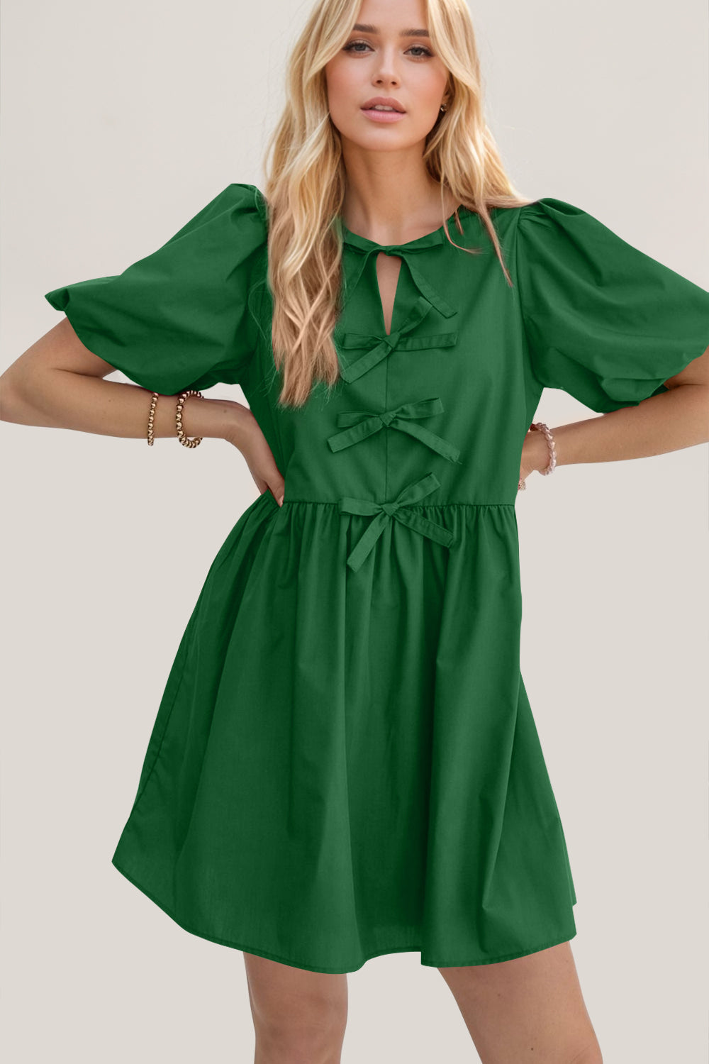 Oh Bow Ruched Puff Sleeve Mini Dress.