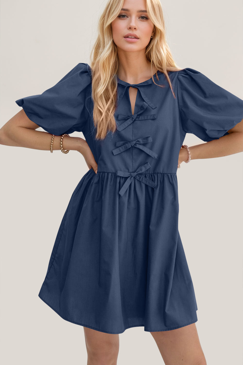 Oh Bow Ruched Puff Sleeve Mini Dress.