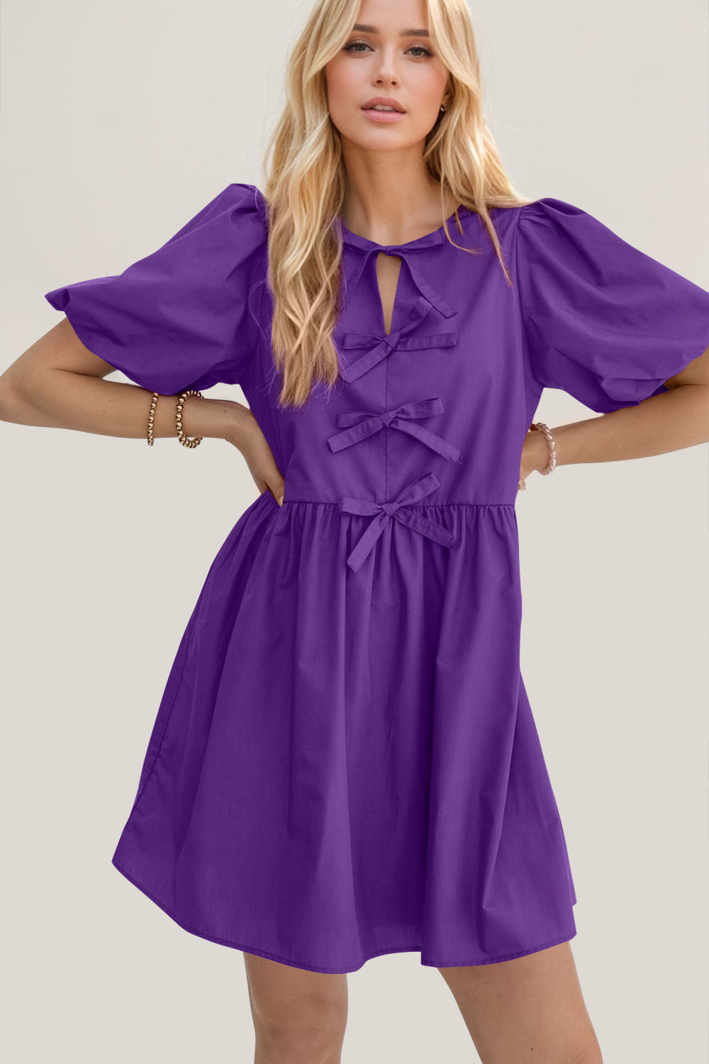 Oh Bow Ruched Puff Sleeve Mini Dress.