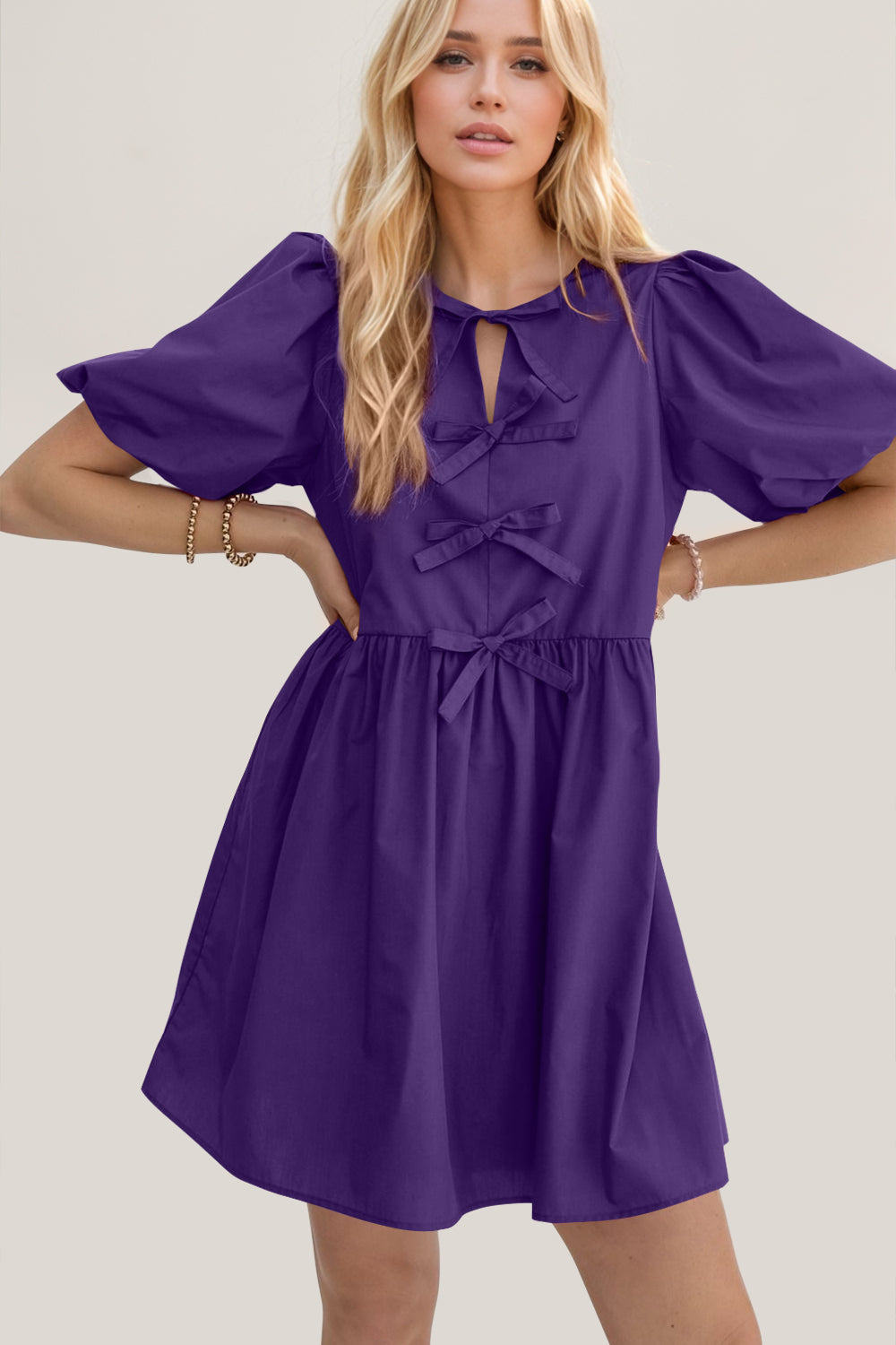 Oh Bow Ruched Puff Sleeve Mini Dress.