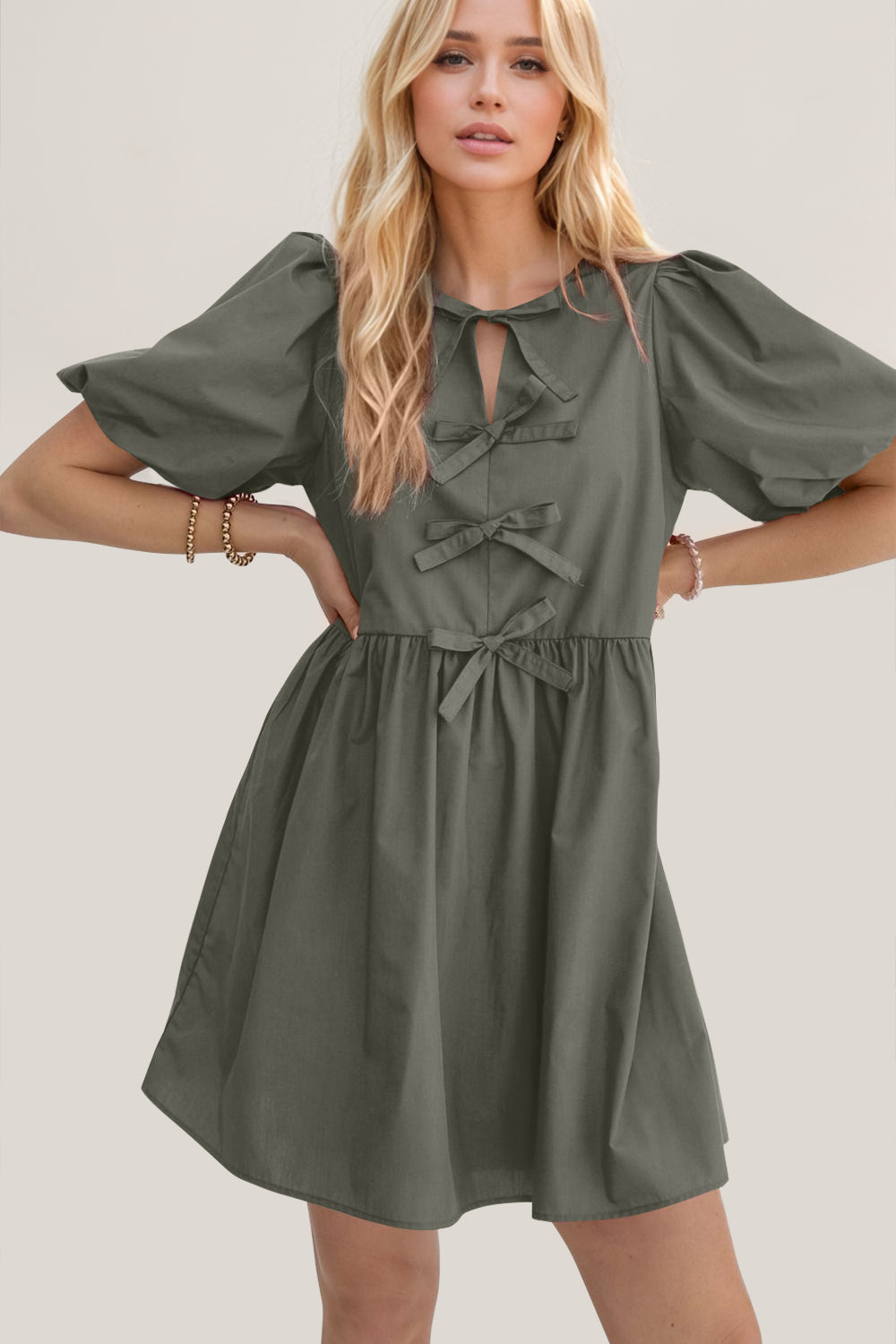 Oh Bow Ruched Puff Sleeve Mini Dress.