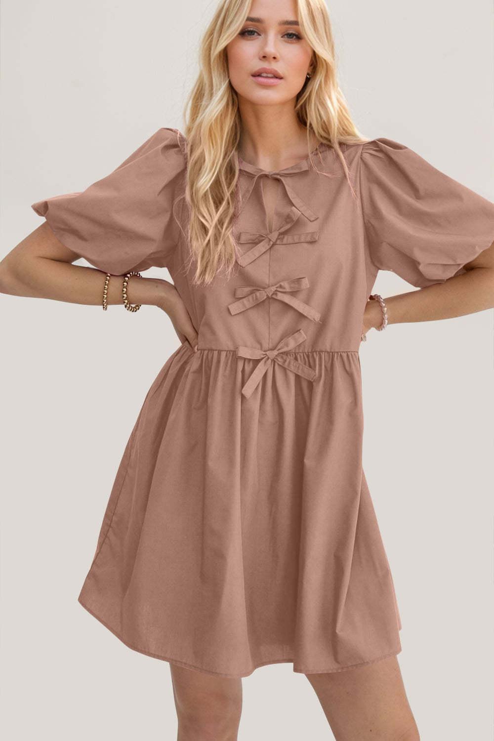 Oh Bow Ruched Puff Sleeve Mini Dress.