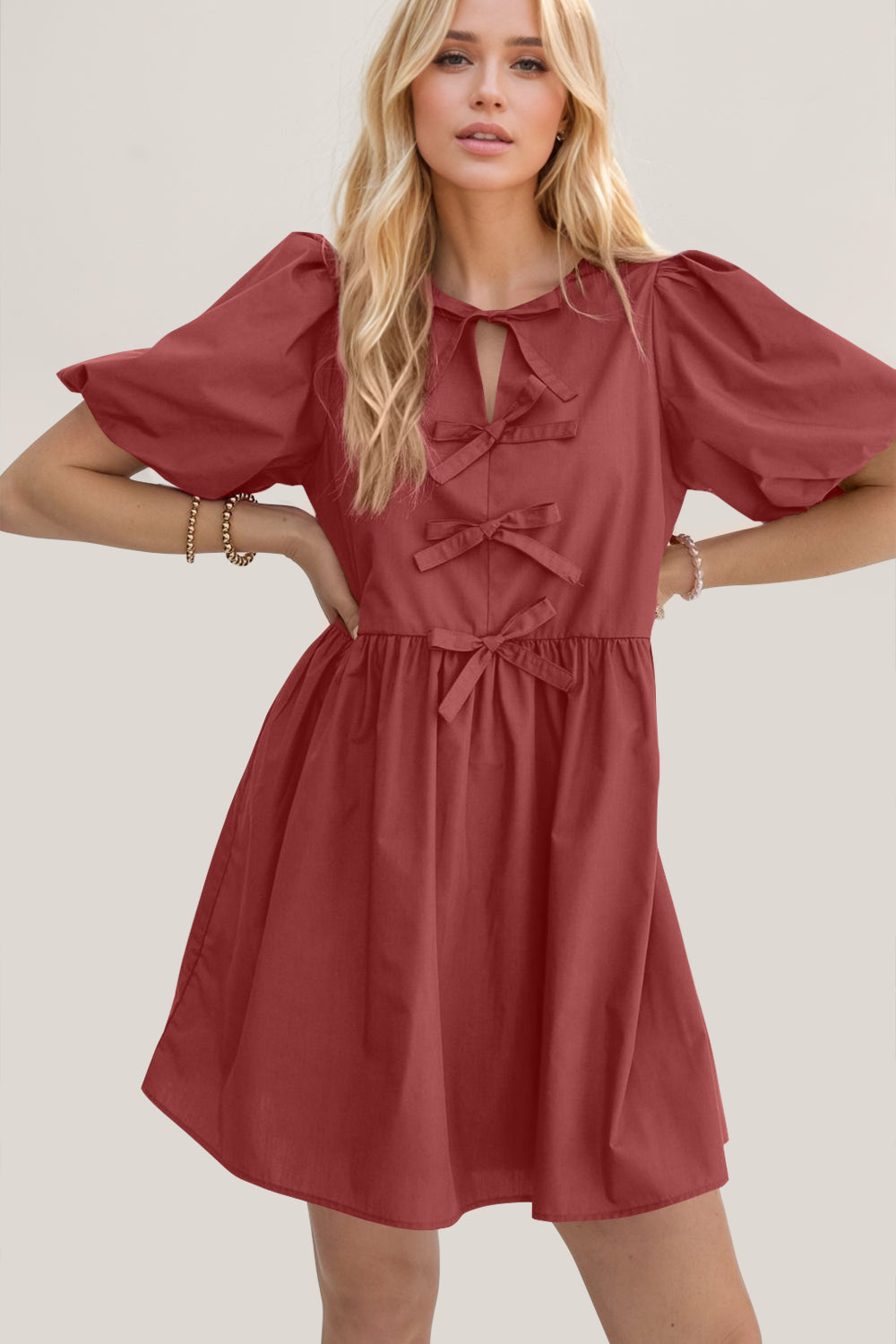 Oh Bow Ruched Puff Sleeve Mini Dress.