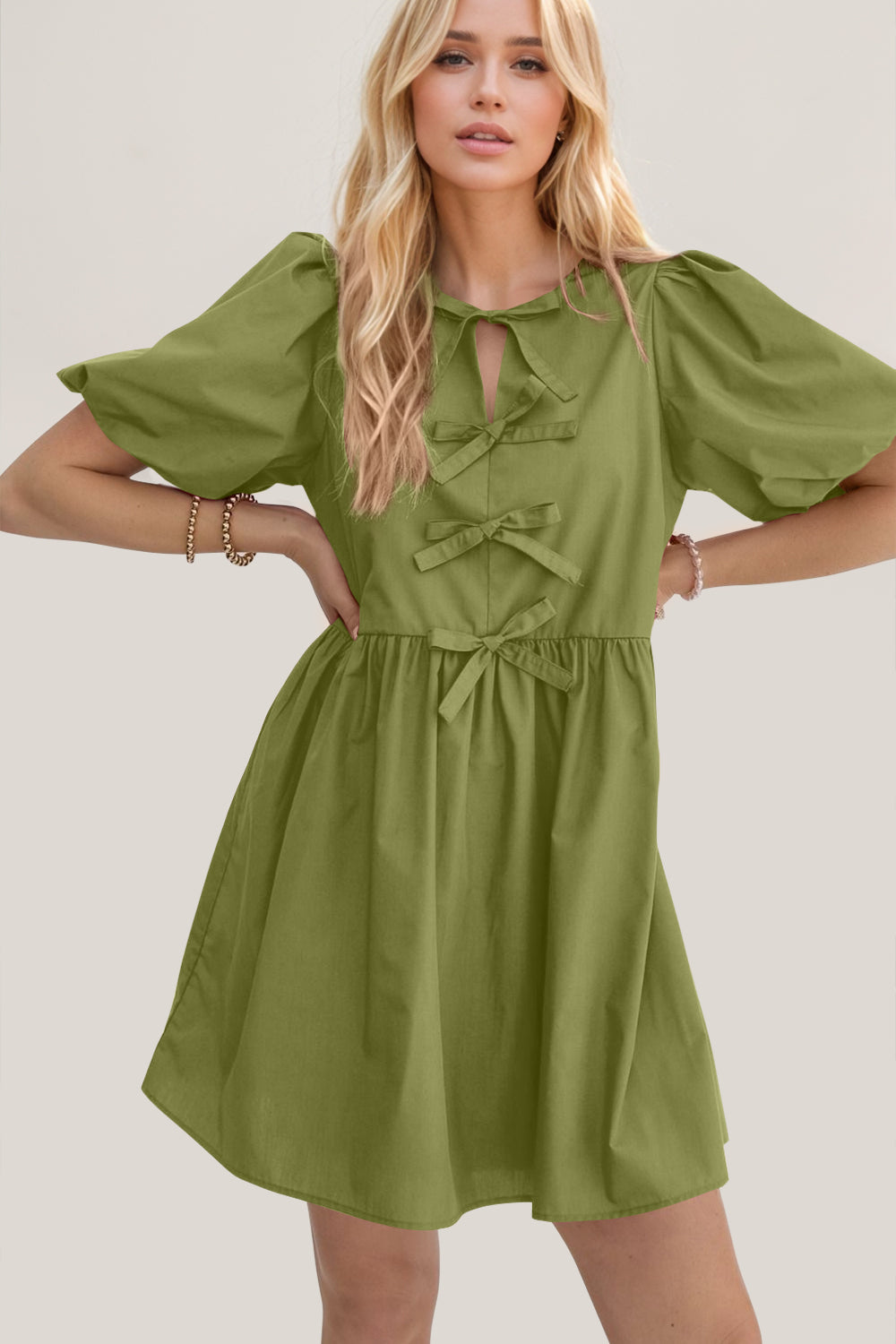 Oh Bow Ruched Puff Sleeve Mini Dress.