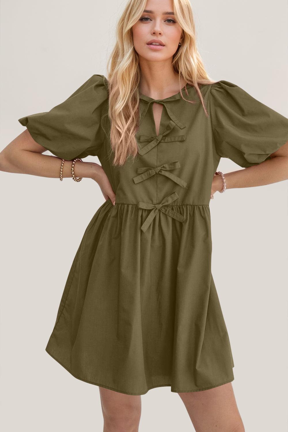 Oh Bow Ruched Puff Sleeve Mini Dress.