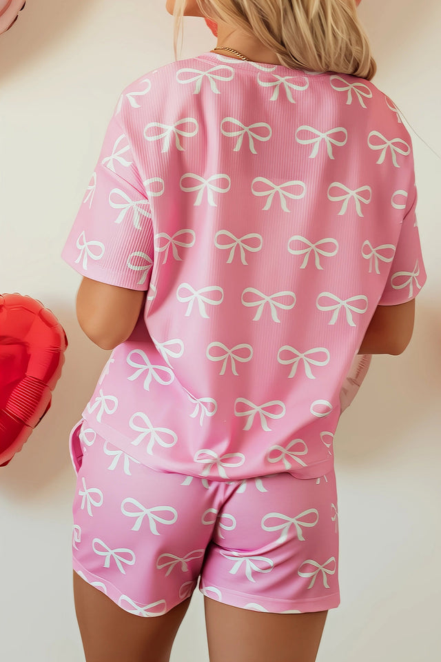 Bowknot printed notched t-shirt and shorts set, women's stylish two-piece outfit, comfortable polyester set, cute bow print, notched t-shirt, casual summer shorts, slightly stretchy fabric, ideal for relaxed everyday wear