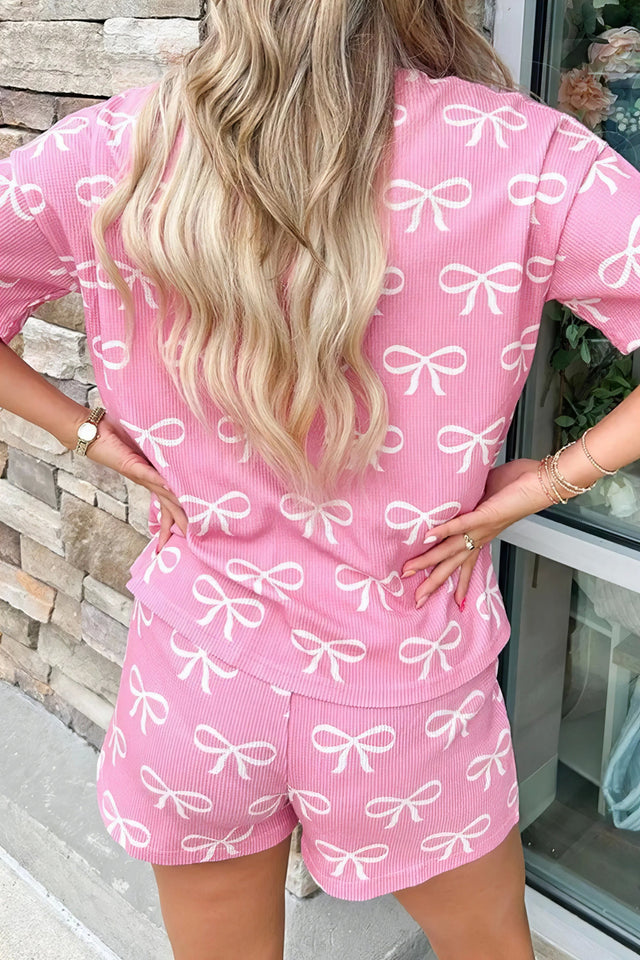 Bowknot printed notched t-shirt and shorts set, women's stylish two-piece outfit, comfortable polyester set, cute bow print, notched t-shirt, casual summer shorts, slightly stretchy fabric, ideal for relaxed everyday wear