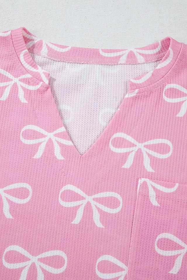 Bowknot printed notched t-shirt and shorts set, women's stylish two-piece outfit, comfortable polyester set, cute bow print, notched t-shirt, casual summer shorts, slightly stretchy fabric, ideal for relaxed everyday wear