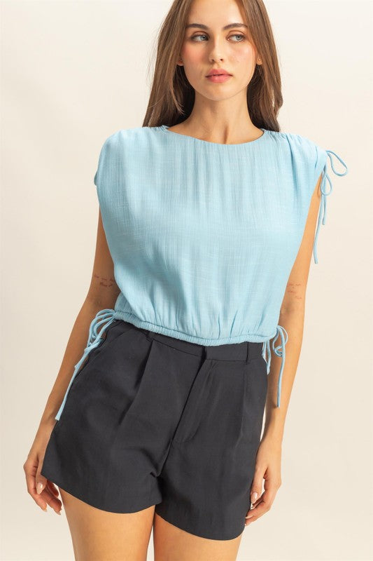 Bubble hem side tie detail round neck sleeveless blouse, slightly stretchy.