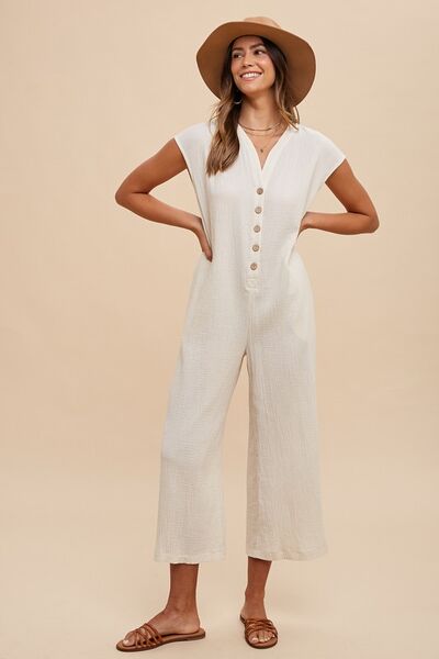 Half Sleeve Wide Leg Jumpsuit with Tie and Ruched Details.