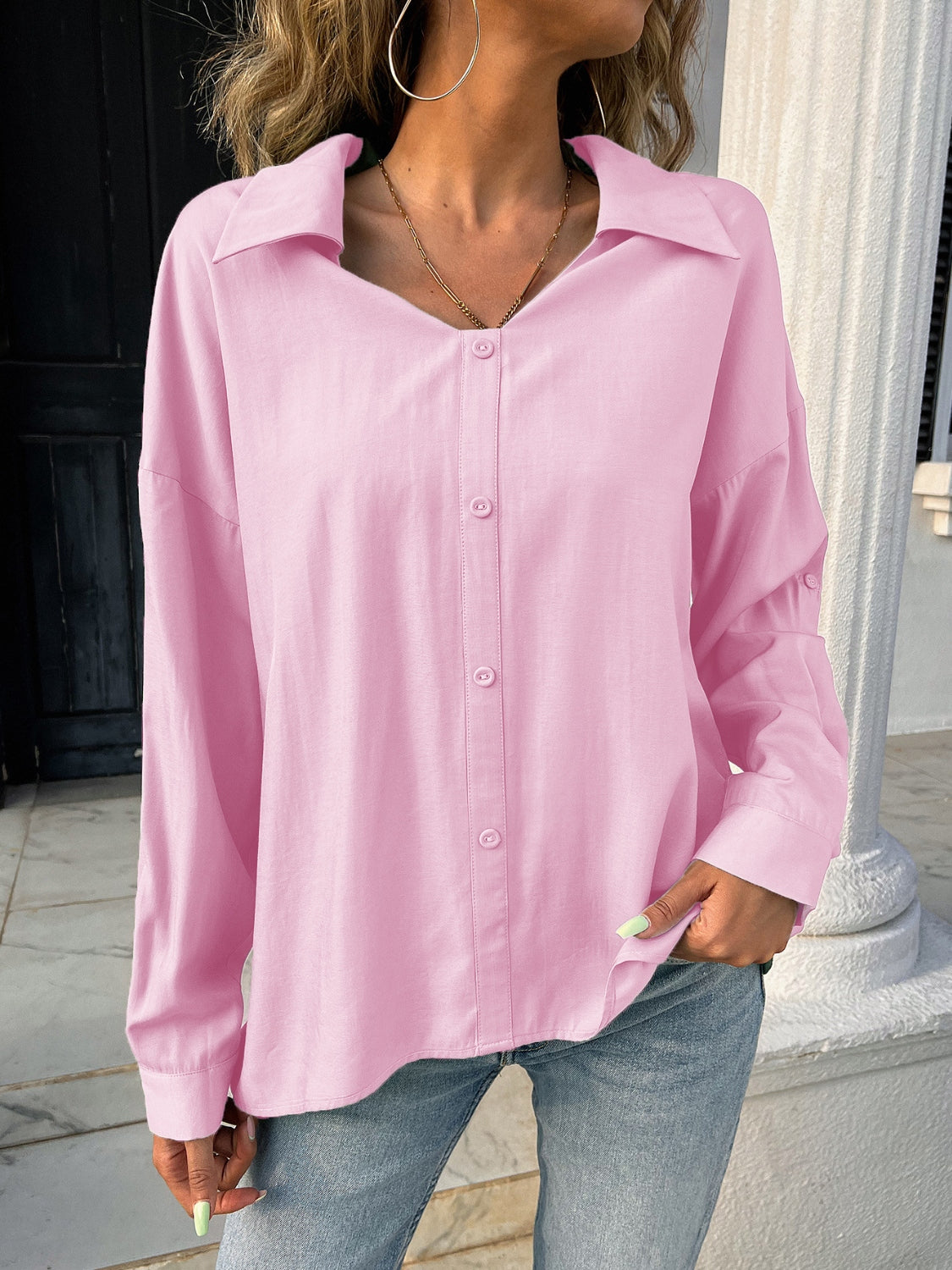 Button down collared neck long sleeve shirt with slit.