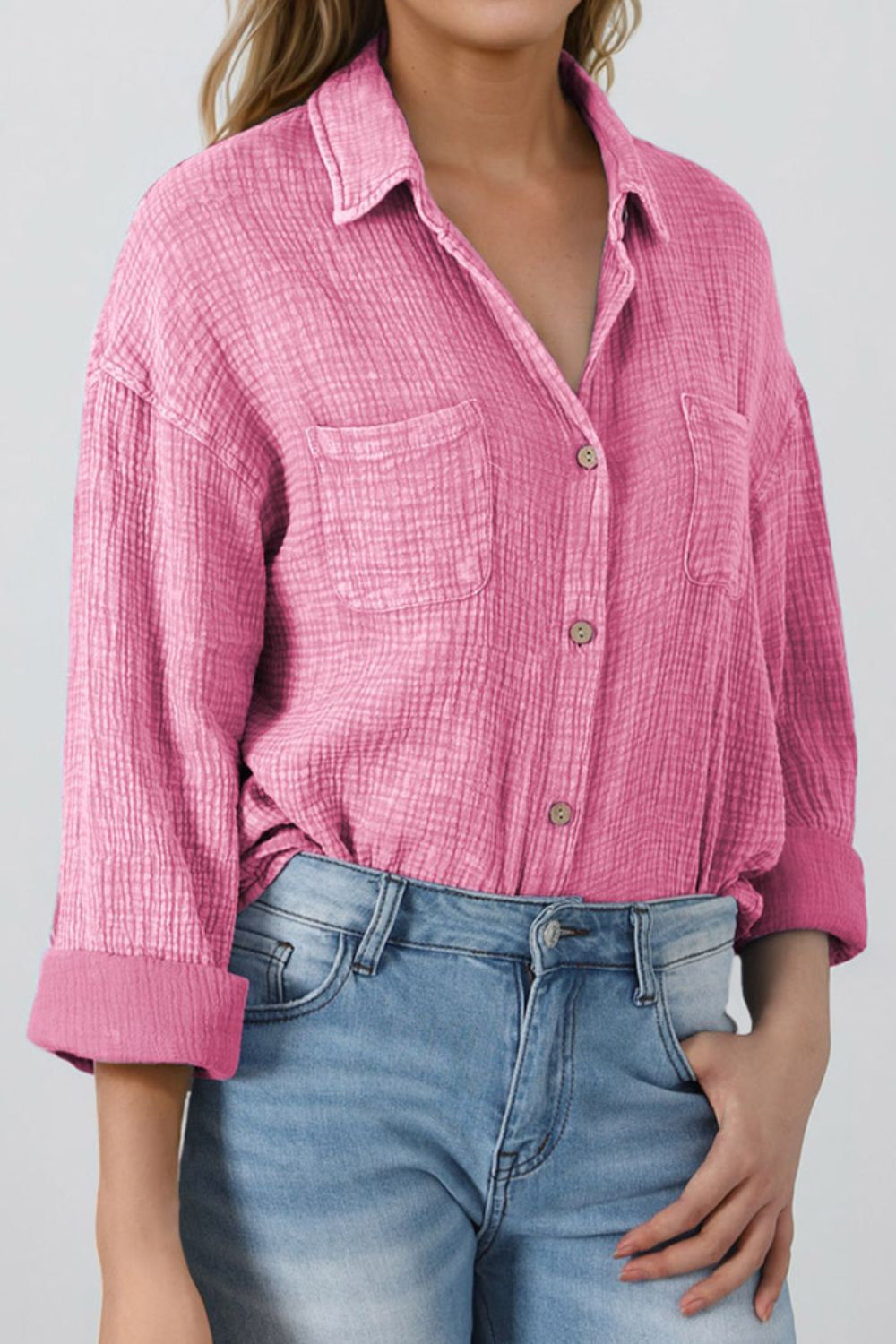 Button down collared neck long sleeve shirt with pockets.
