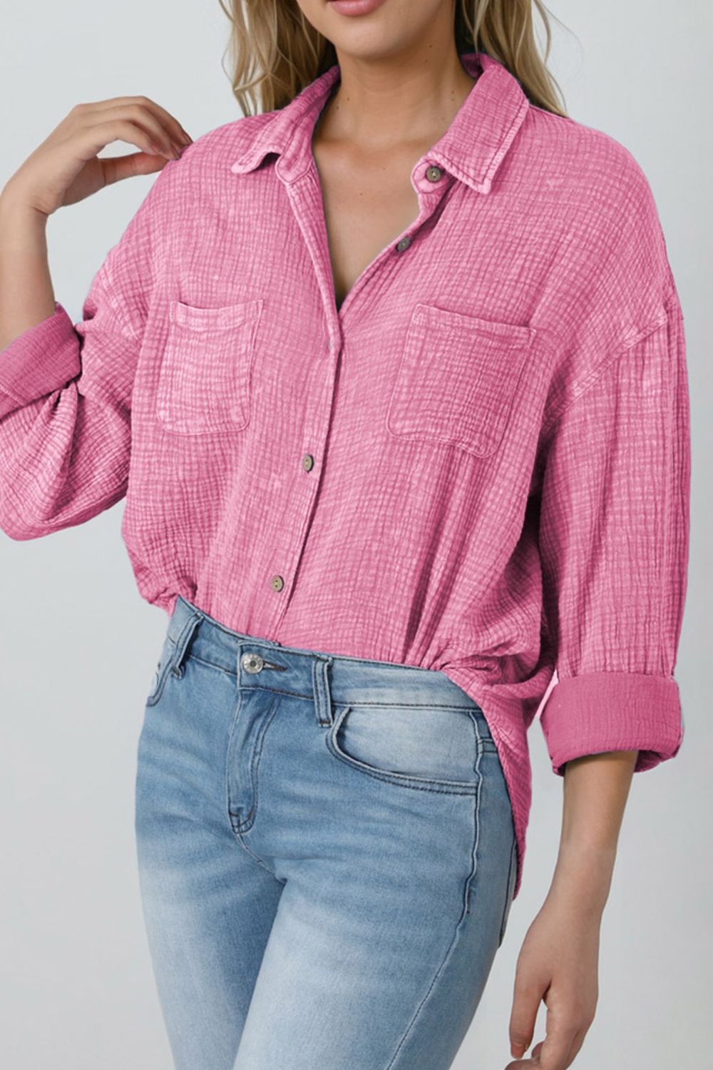 Button down collared neck long sleeve shirt with pockets.