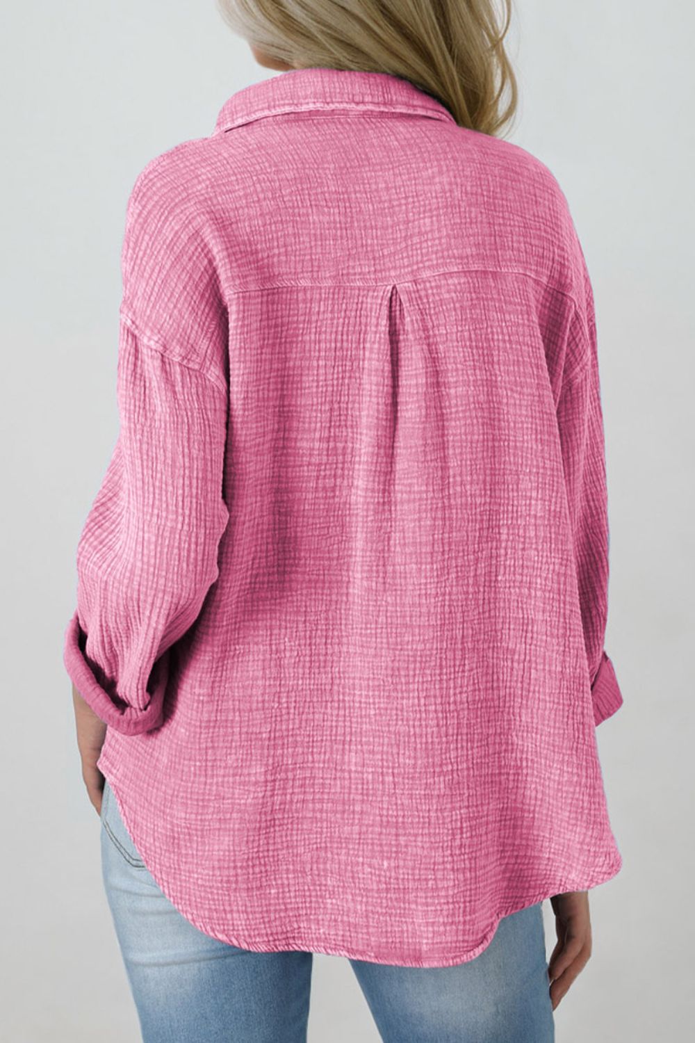 Button down collared neck long sleeve shirt with pockets.
