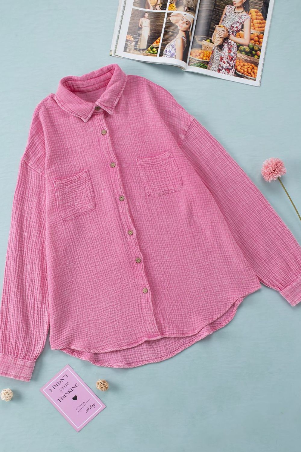 Button down collared neck long sleeve shirt with pockets.