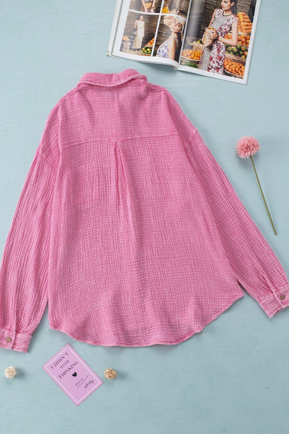 Button down collared neck long sleeve shirt with pockets.