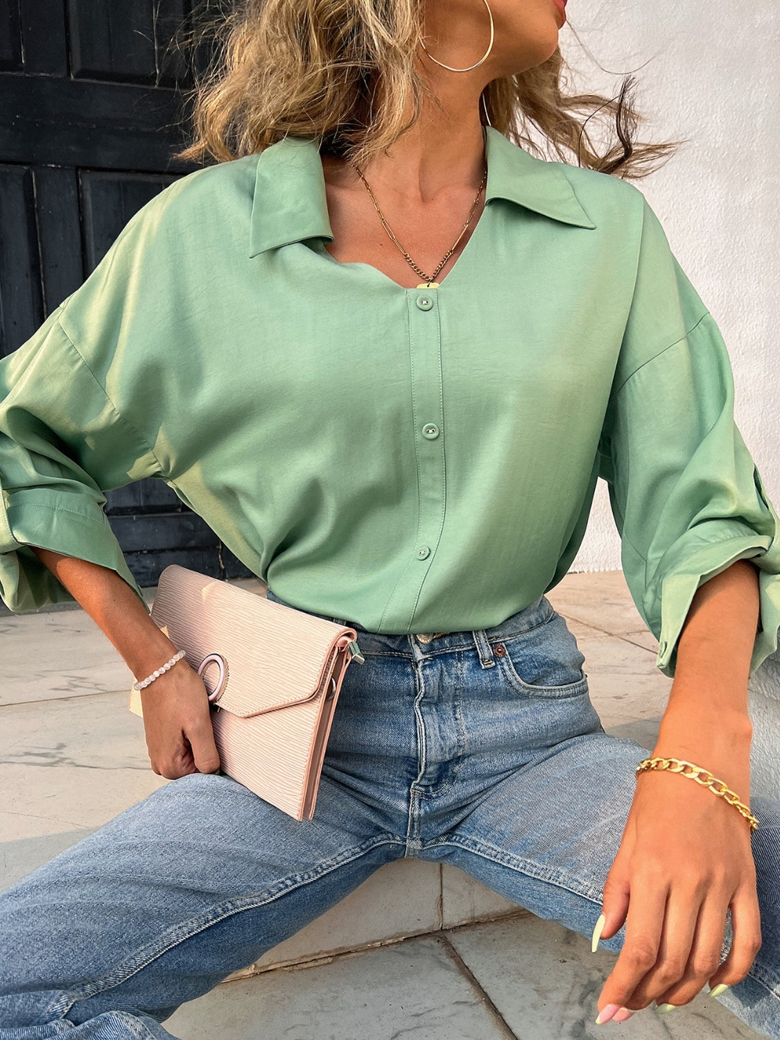 Button down collared neck long sleeve shirt with slit.