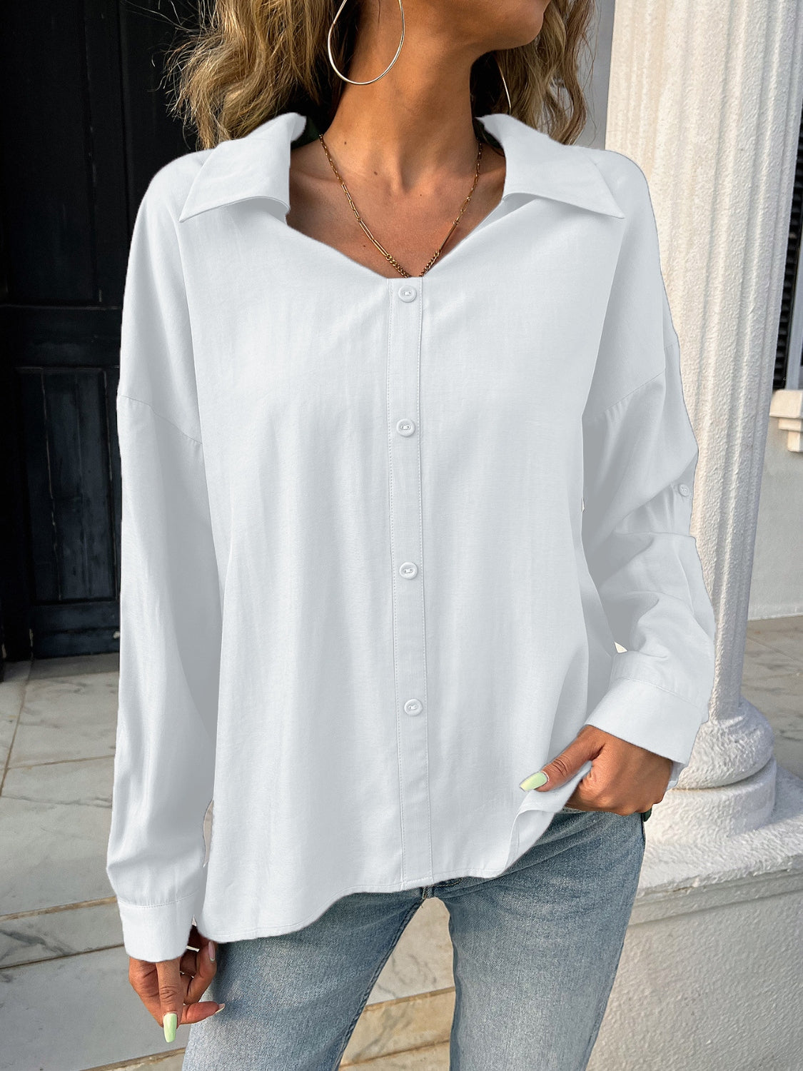 Button down collared neck long sleeve shirt with slit.